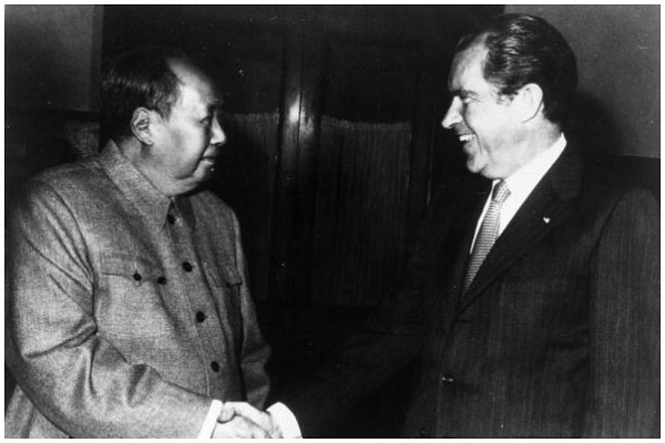 Chinese communist leader Chairman Mao Zedong (1893 - 1976) shakes hands with American president Richard Nixon (1914 - 1994) in Peking (Beijing) during his visit to China. (Photo by Keystone/Getty Images)
